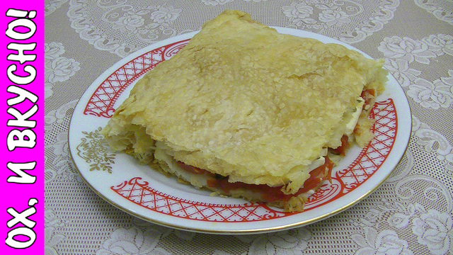 Фото к рецепту: Легкий пирог с помидорами и брынзой