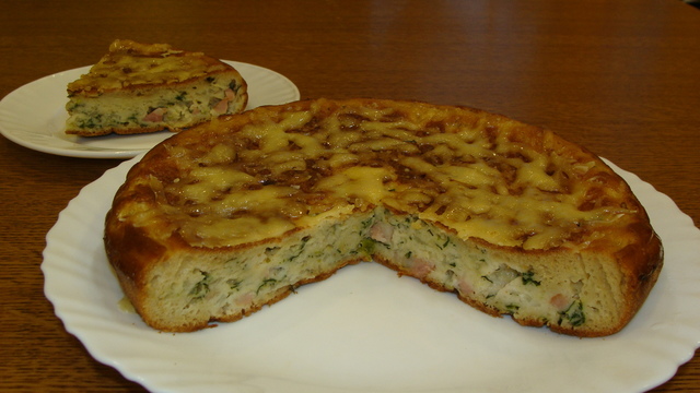 Фото к рецепту: Пирог с капустой на сковороде.