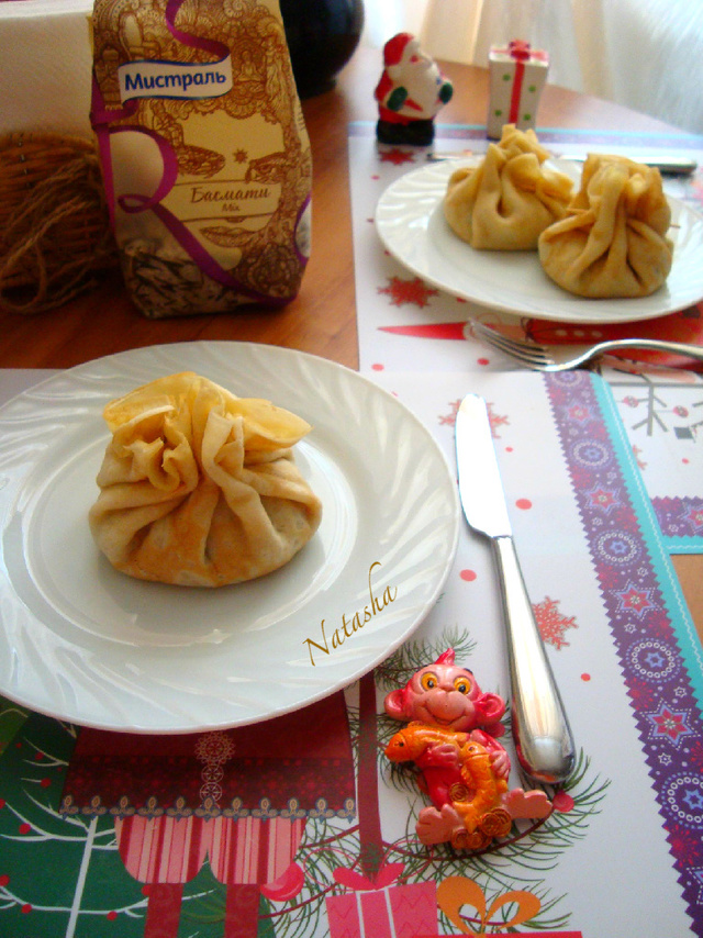 Фото к рецепту: Блинные мешочки с начинкой из риса басмати mix, печенью кролика и тыквой.