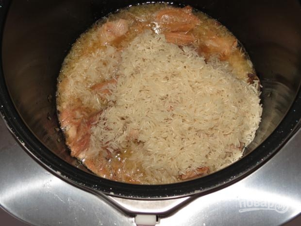 Рисовая каша с тушенкой - фото шаг 2
