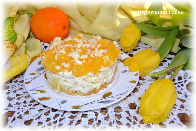 Фото к рецепту: Салат из сыра с апельсинами