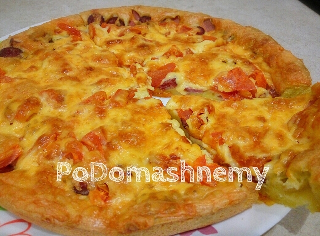 Фото к рецепту: Заливная пицца в духовке