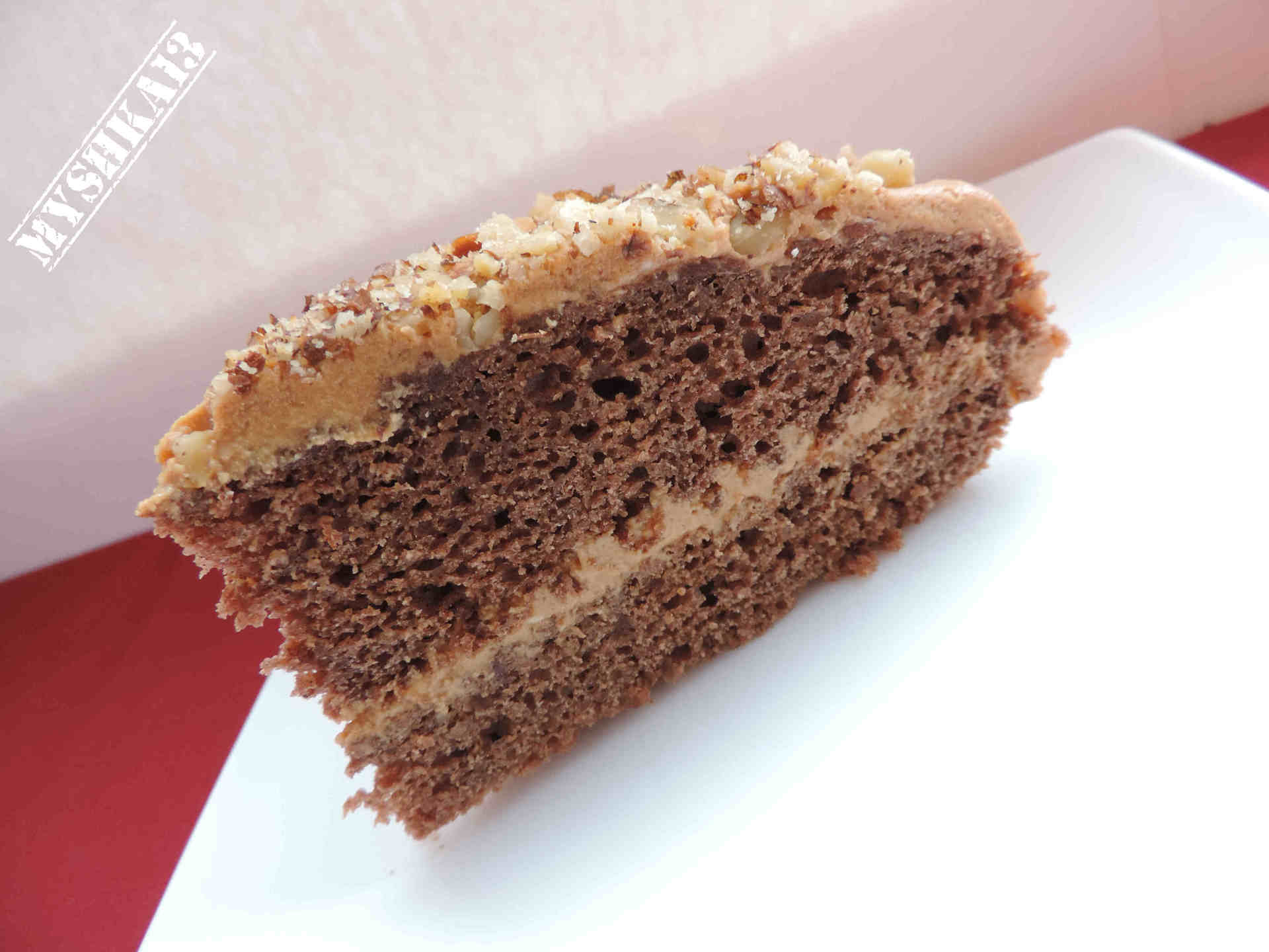 Фото к рецепту: Шоколадный торт с орехами в карамели «мечта сластёны»