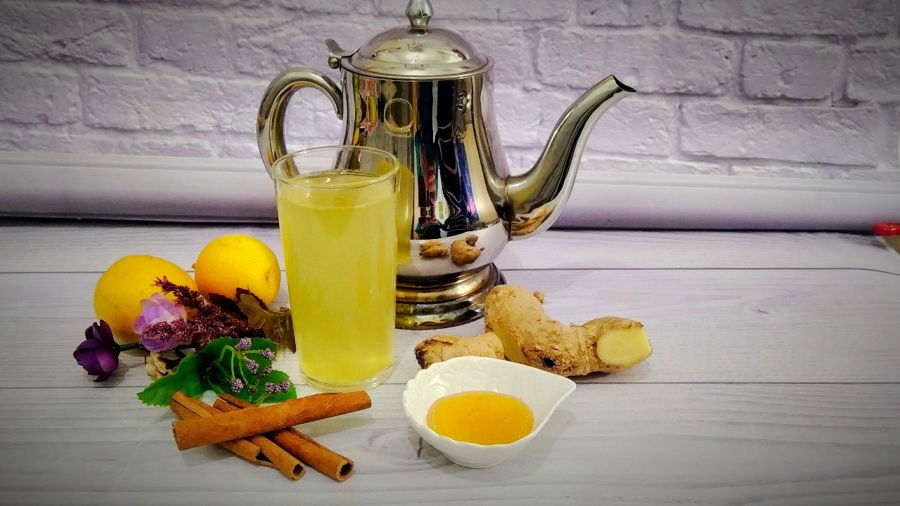 Фото к рецепту: Правильный имбирный чай с апельсином и лимоном